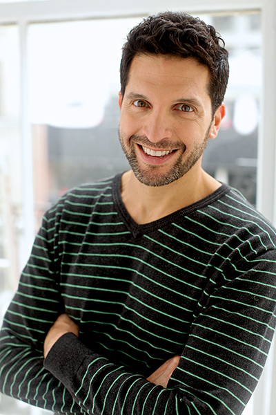 Al in striped sweater